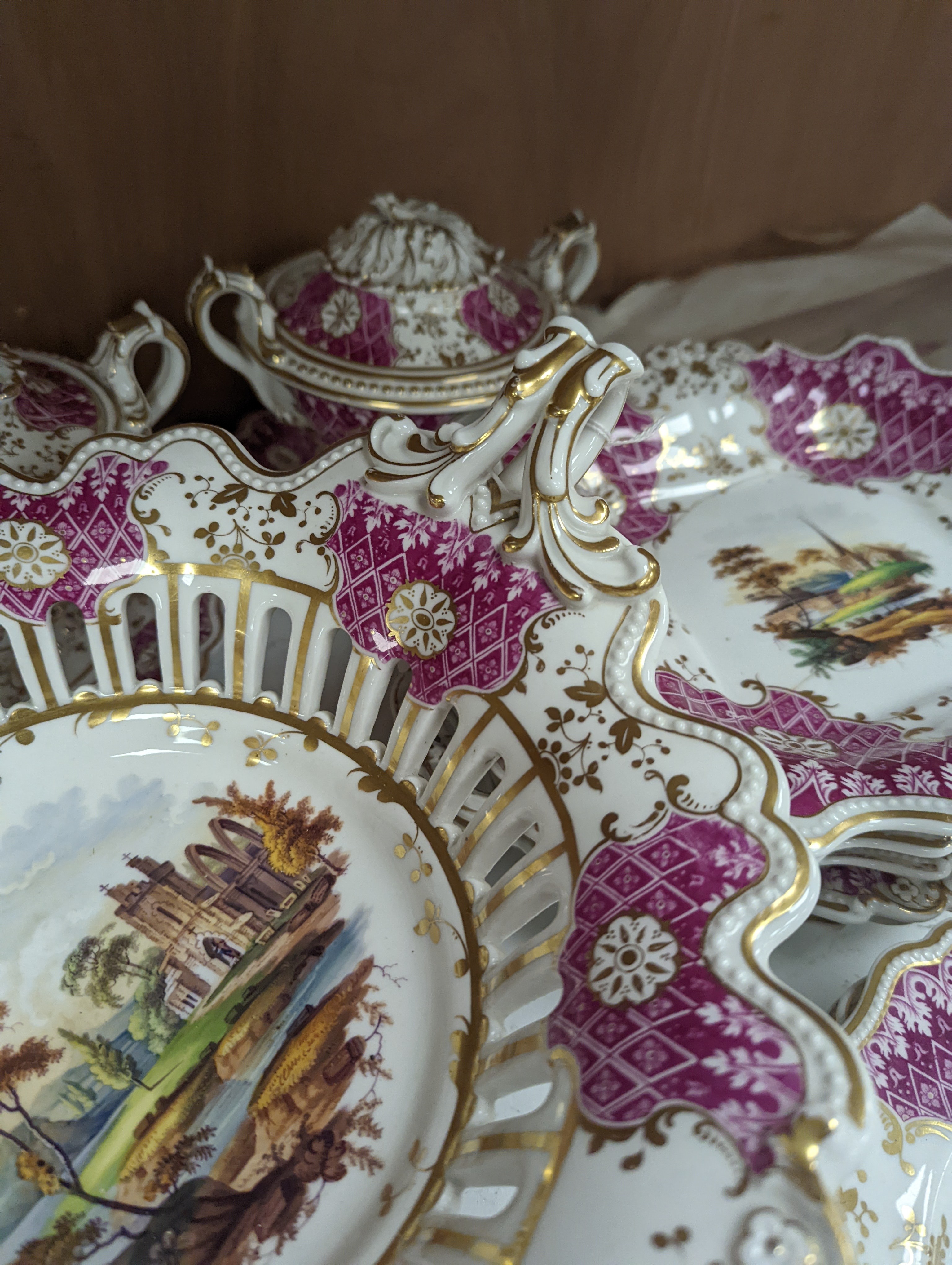 A Ridgways porcelain topographical part dessert service, c.1835, pattern number 2168, the sauce tureens and covers pattern number 2179